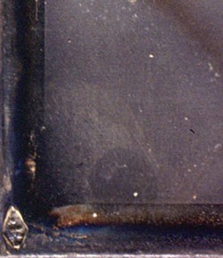 Plate mark found on daguerreotype portrait of Robert Hollingsworth. 